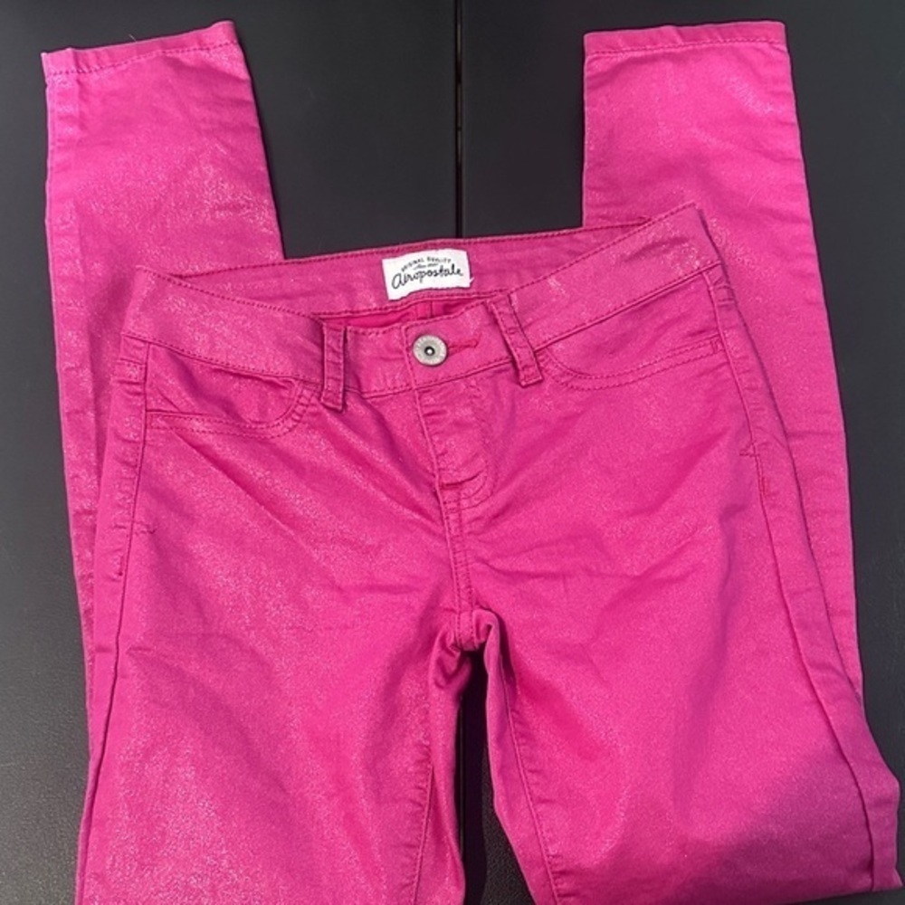 Aeropostale women’s fuchsia (hot pink) with a silver sparkle skinny size 0 Jeans